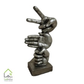 مجسمه سنگ کاغذ قیچی