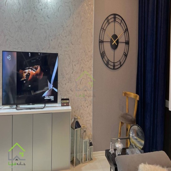ساعت دیواری گرد فلزی اطلس